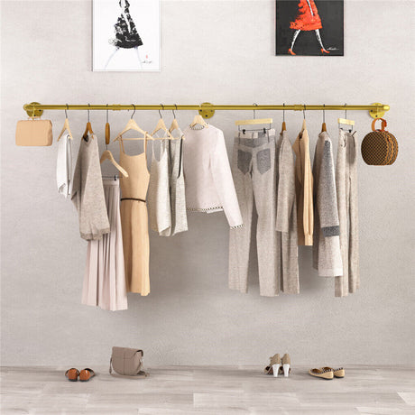 Gold wall mounted clothes rail in vintage iron
