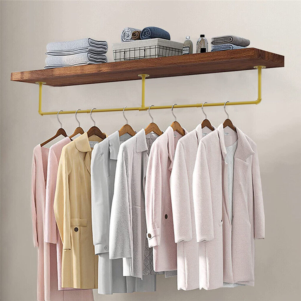Gold wall mounted clothes rail in vintage iron