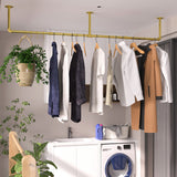 Gold wall mounted clothes rail in vintage iron