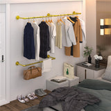 Gold wall mounted clothes rail in vintage iron