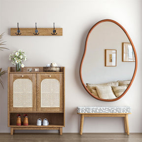 Wye River small asymmetrical art deco beech wood wall mirror in a living room
