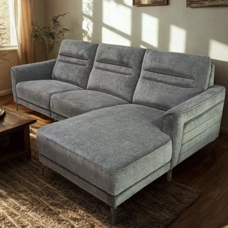 Gandia charcoal grey fabric chaise sofa in a modern living room