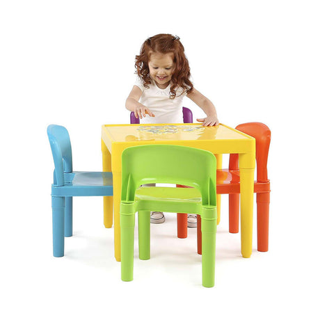 Children's play table with four colourful chairs