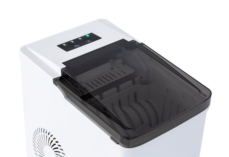 Viewing window on the ice maker showing ice cubes being produced