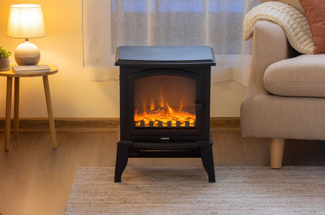Front view of the 2000 W electric fireplace heater showing glowing logs