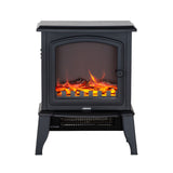 Electric fireplace heater in a living room beside a sofa