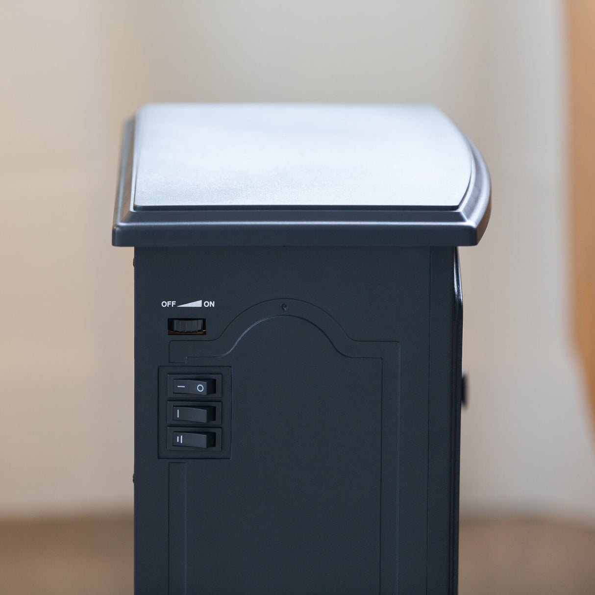 Rear view of the 36.5 x 24 x 46 cm electric fireplace heater