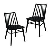 Dorrien black solid oak dining chair in a modern dining room