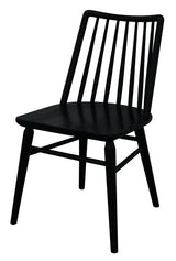 Dorrien black solid oak dining chair in a modern dining room