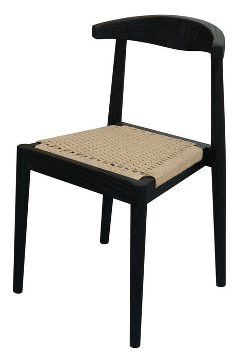 Vine Vale black solid oak dining chair with paper cord seat in a modern dining room