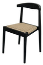 Vine Vale black solid oak dining chair with paper cord seat in a modern dining room