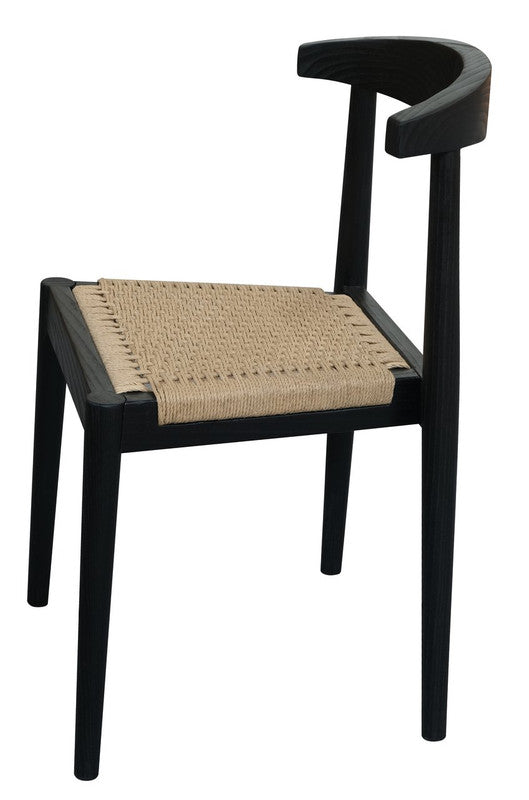 Vine Vale black solid oak dining chair with paper cord seat in a modern dining room