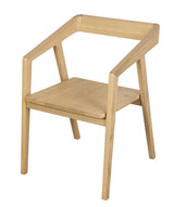 Stonewell natural solid oak dining armchair in a modern dining room
