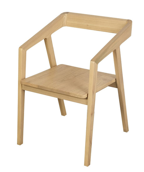 Stonewell natural solid oak dining armchair in a modern dining room