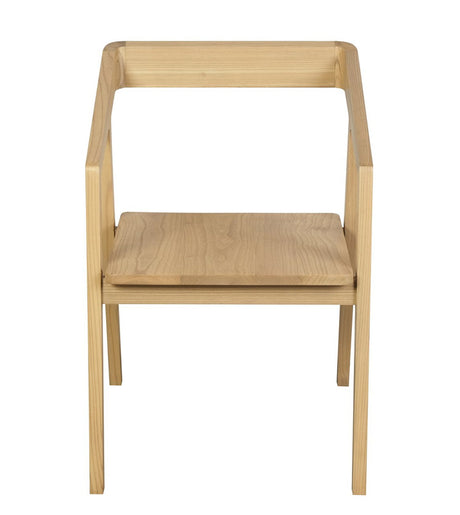 Stonewell natural solid oak dining armchair in a modern dining room