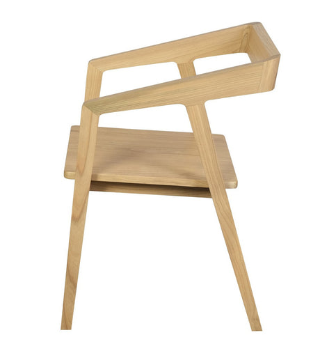 Stonewell natural solid oak dining armchair in a modern dining room
