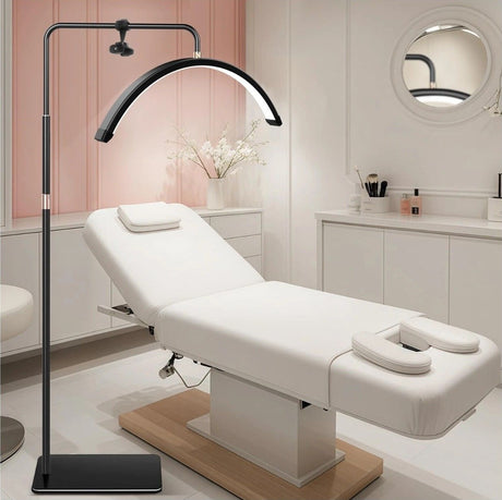 Half moon LED floor fill light in black with phone holder and remote