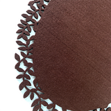 Brown leaf edge felt placemat detail