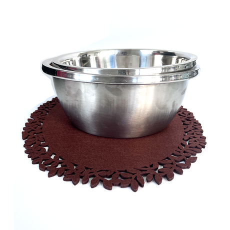 Brown leaf edge felt placemats stacked