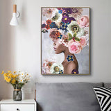 Gold framed canvas print styled on a neutral interior wall