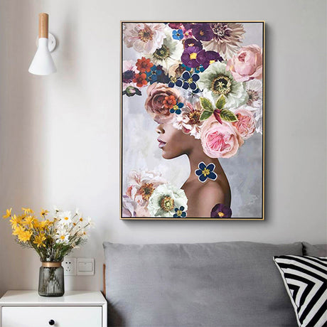 Gold framed canvas print styled on a neutral interior wall