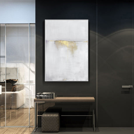 Close view of the gold and white abstract canvas showing soft colour blocks and gilded accents