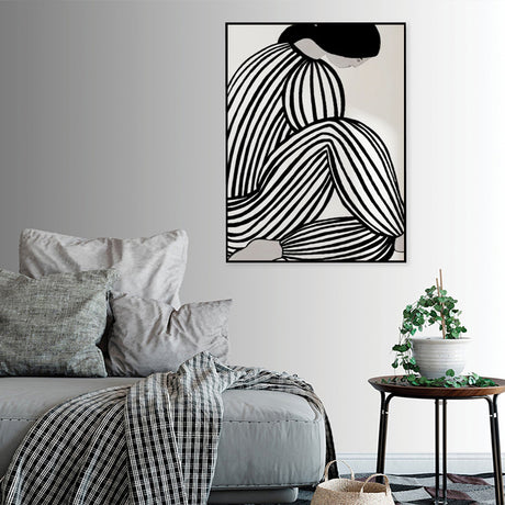 Black floating frame edge detail on the gallery wrapped mid century figure canvas