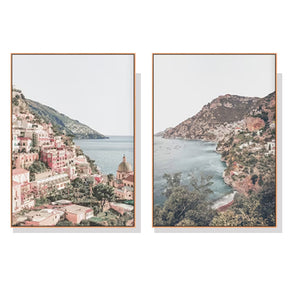 Ghent coastal village wood framed canvas wall art pair in a dining room