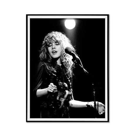 Young Stevie Nicks in concert canvas wall art 60 x 90 cm in a black floating frame