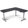 Geraldton black and silver L shaped electric standing corner desk in a home office