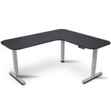 Geraldton black and silver L shaped electric standing corner desk in a home office