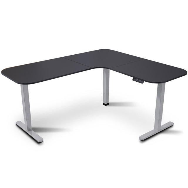 Geraldton black and silver L shaped electric standing corner desk in a home office