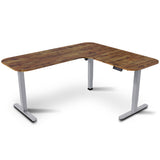 Geraldton walnut and silver electric standing corner desk in a modern home office