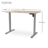 Chapman light oak standing desk in a home office