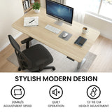 Chapman light oak standing desk in a home office