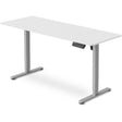 Turner white electric standing desk with silver frame in a home office