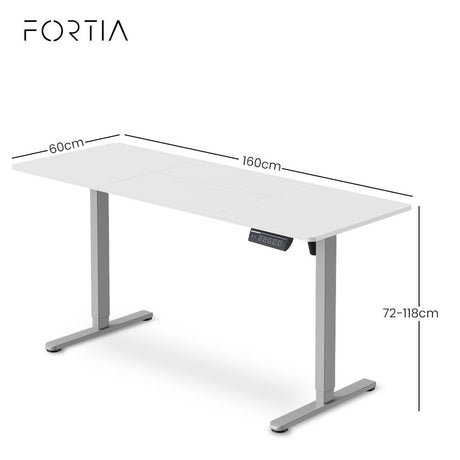 Turner white electric standing desk with silver frame in a home office
