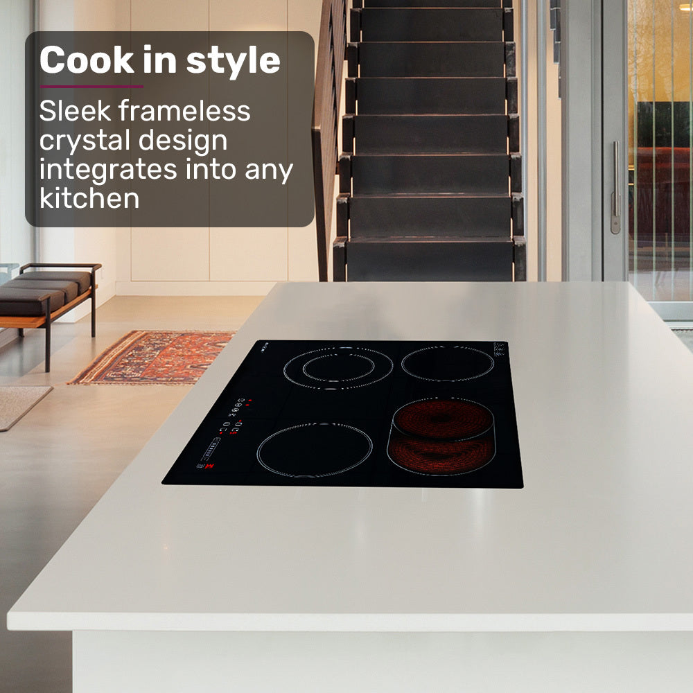 Ceramic cooktop installed flush in a kitchen benchtop with pots on two zones