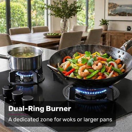 Close up of the wok burner and cast iron trivet on the black glass cooktop