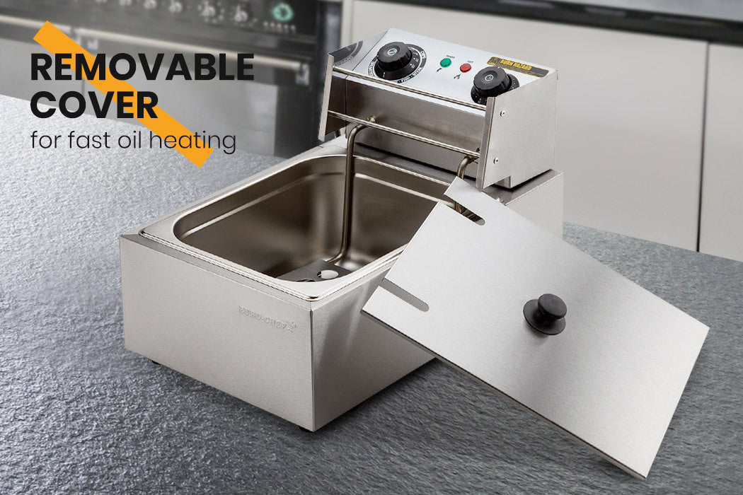 Hinged oil heating plate lifted clear of the deep fryer tank