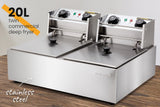 Front view of the twin tank fryer showing two sets of temperature and timer dials