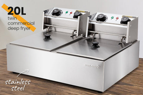 Front view of the twin tank fryer showing two sets of temperature and timer dials