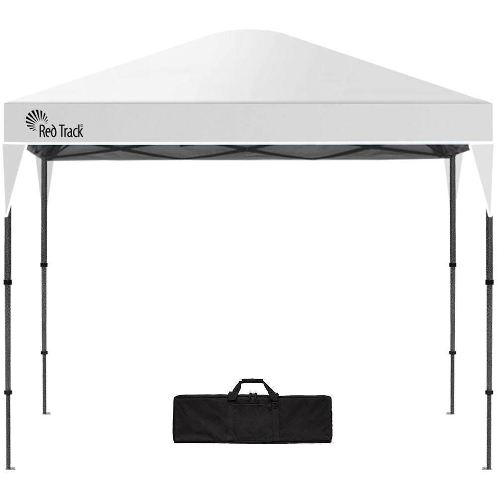 White 3.6 x 2.2 m folding gazebo set up outdoors, front view