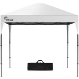 White 3 x 3 m pop up gazebo set up outdoors with open sides and a peaked canopy roof