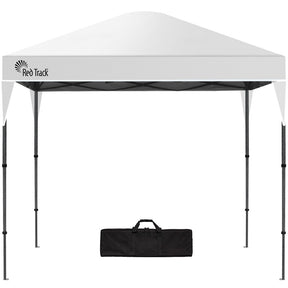 White 3 x 3 m pop up gazebo set up outdoors with open sides and a peaked canopy roof