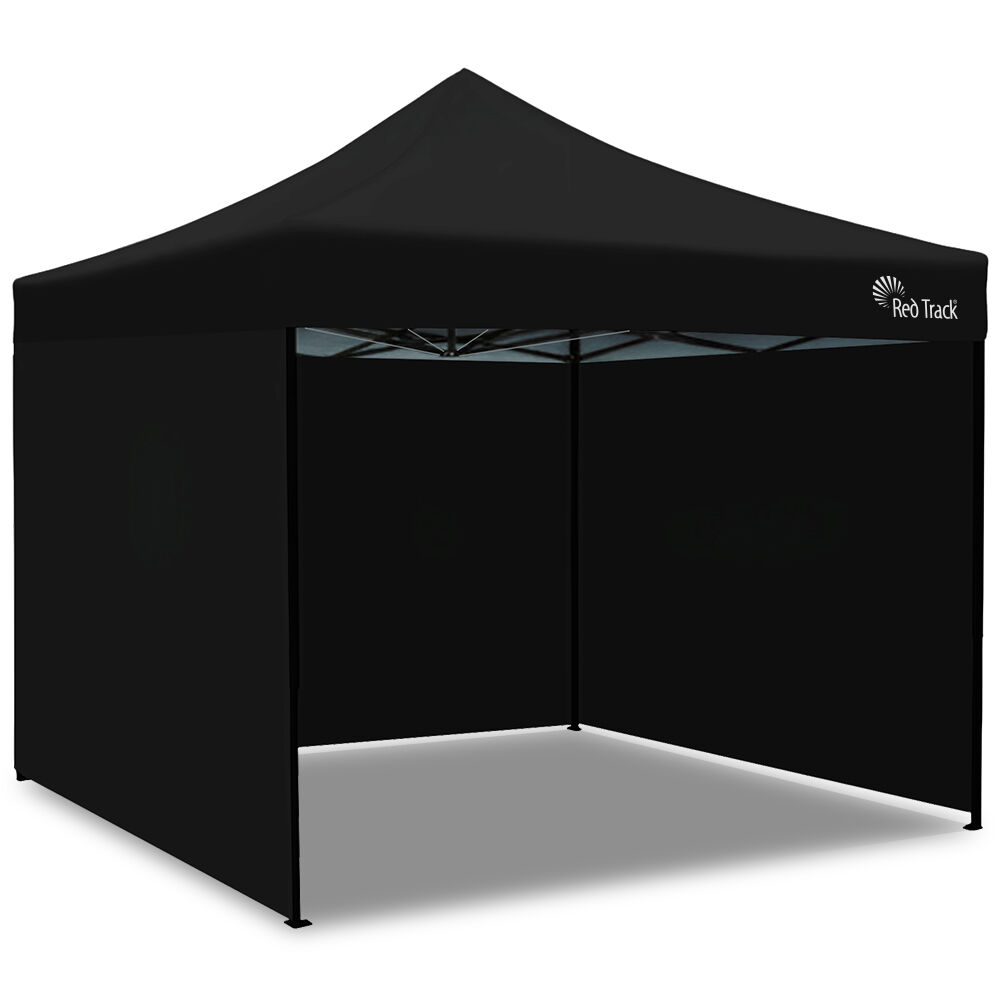 Black 3 x 3 m heavy duty pop up gazebo set up outdoors, front view