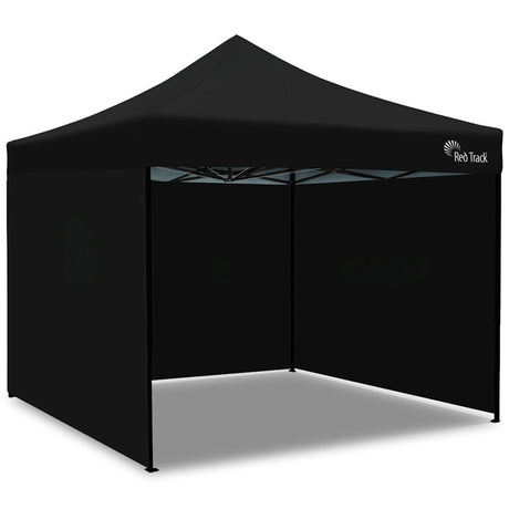 Black 3 x 3 m heavy duty pop up gazebo set up outdoors, front view