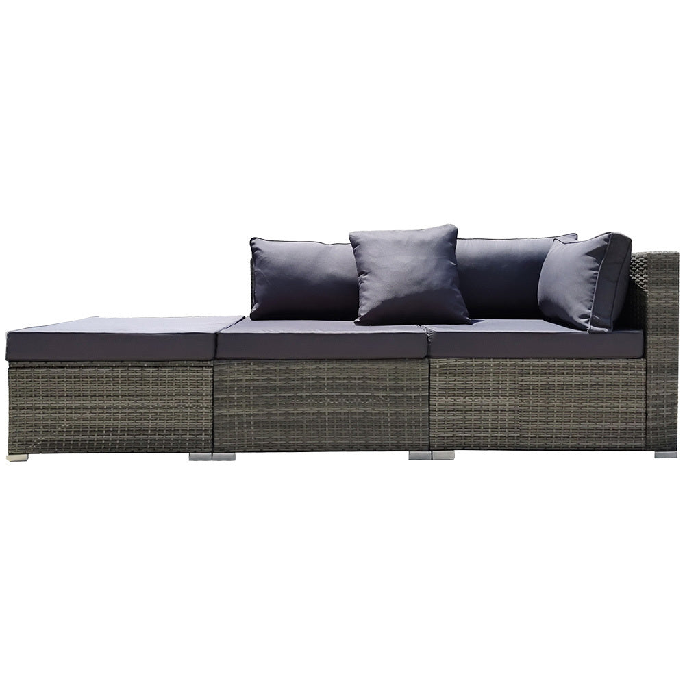 Eimeo grey wicker outdoor corner lounge set in an outdoor setting