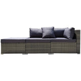 Eimeo grey wicker outdoor corner lounge set in an outdoor setting