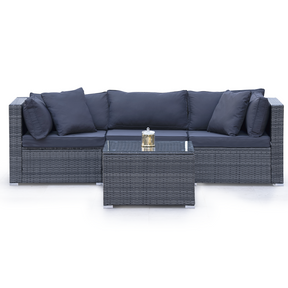 Eimeo grey wicker outdoor corner lounge set in an outdoor setting